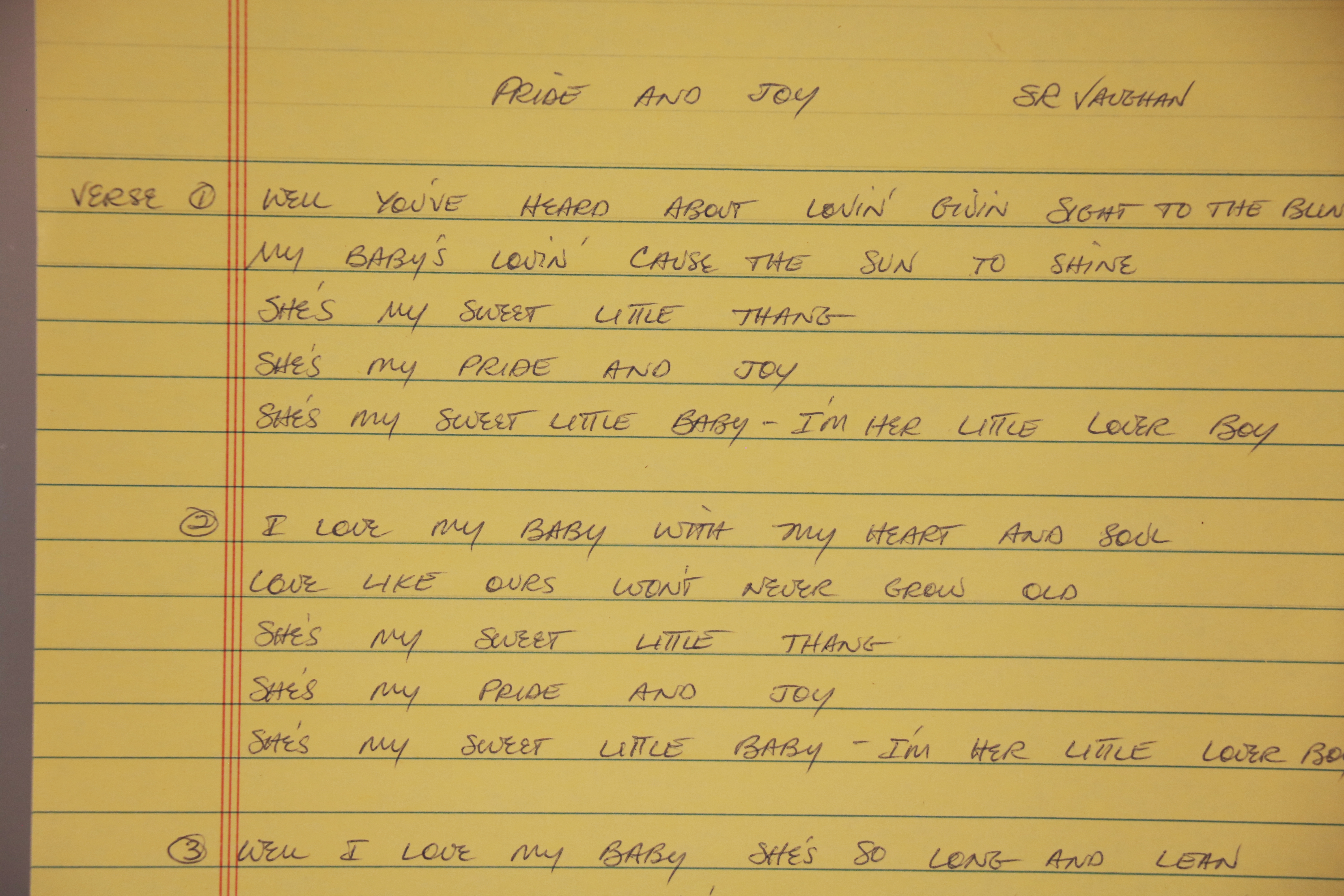 Photo of handwriten lyrics page